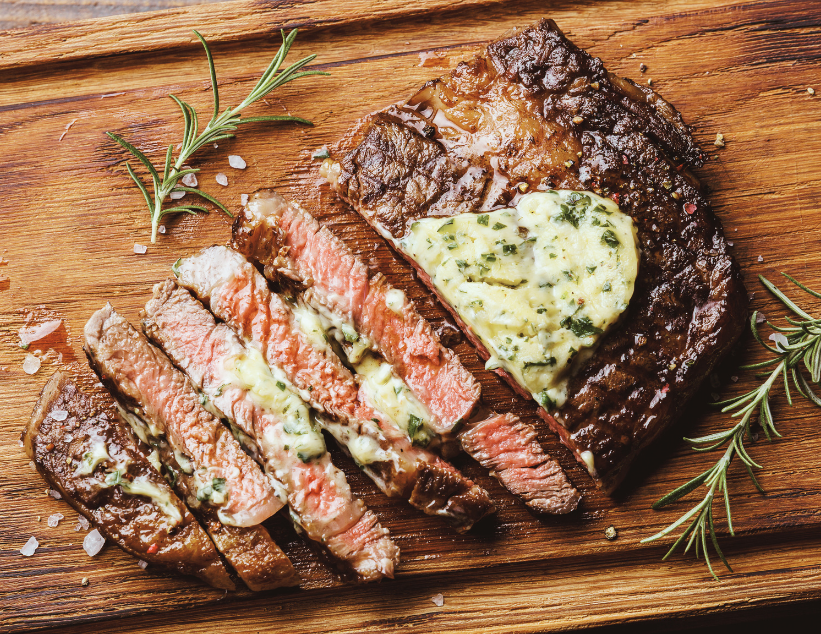 Grilled Ribeye Steak with Herb Butter